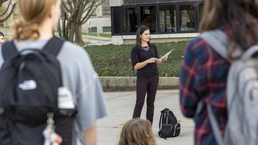 Professor Rachel McLaren teaches a Communication Studies class outdoors